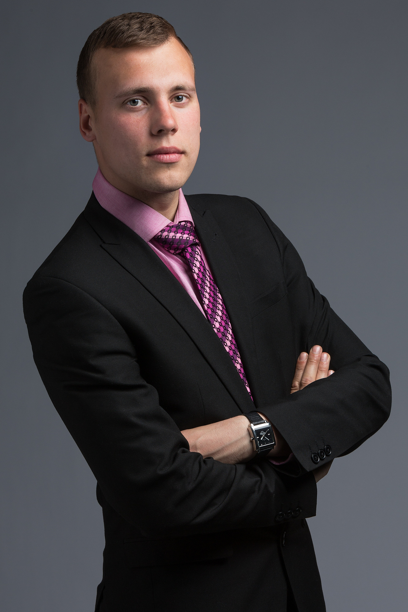 portrait of businessman against a grey background